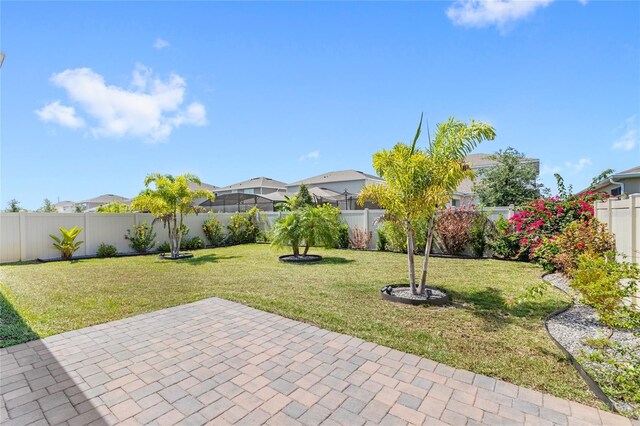 5641 Oak Knoll Dr, Saint Cloud, FL 34771 - view of yard with a patio and a residential view