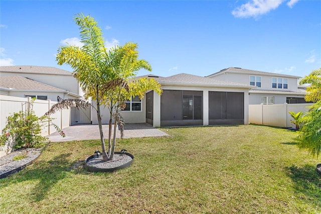 5641 Oak Knoll Dr, Saint Cloud, FL 34771 - rear view of house with a sunroom, a patio area, and stucco siding