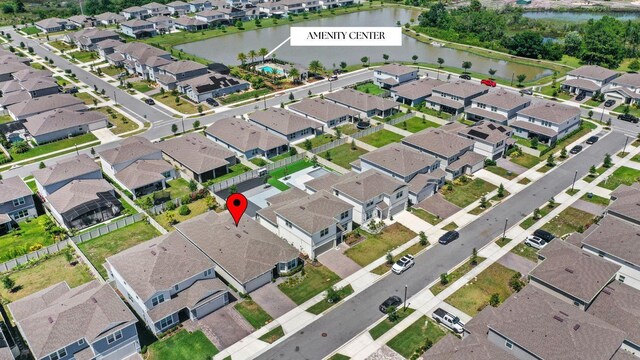 5641 Oak Knoll Dr, Saint Cloud, FL 34771 - aerial overview of property's location with a nearby body of water and nearby suburban area