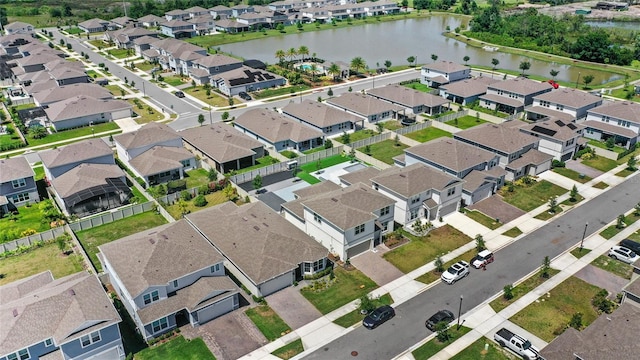 5641 Oak Knoll Dr, Saint Cloud, FL 34771 - aerial view of residential area featuring a large body of water