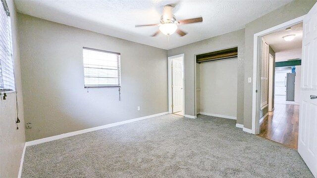 2928 NE 14th Ave, Ocala, FL 34479 - unfurnished bedroom with carpet flooring, multiple windows, a closet, and baseboards