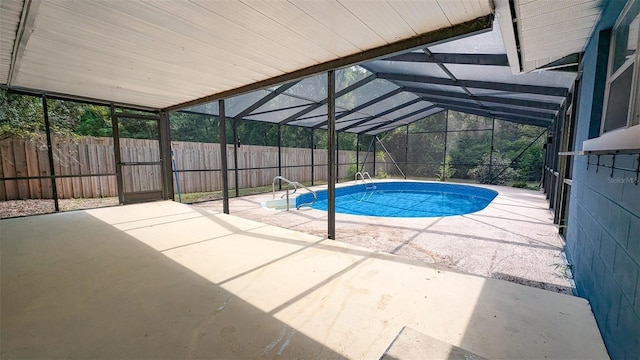 2928 NE 14th Ave, Ocala, FL 34479 - view of swimming pool featuring a patio area, a fenced backyard, and a lanai