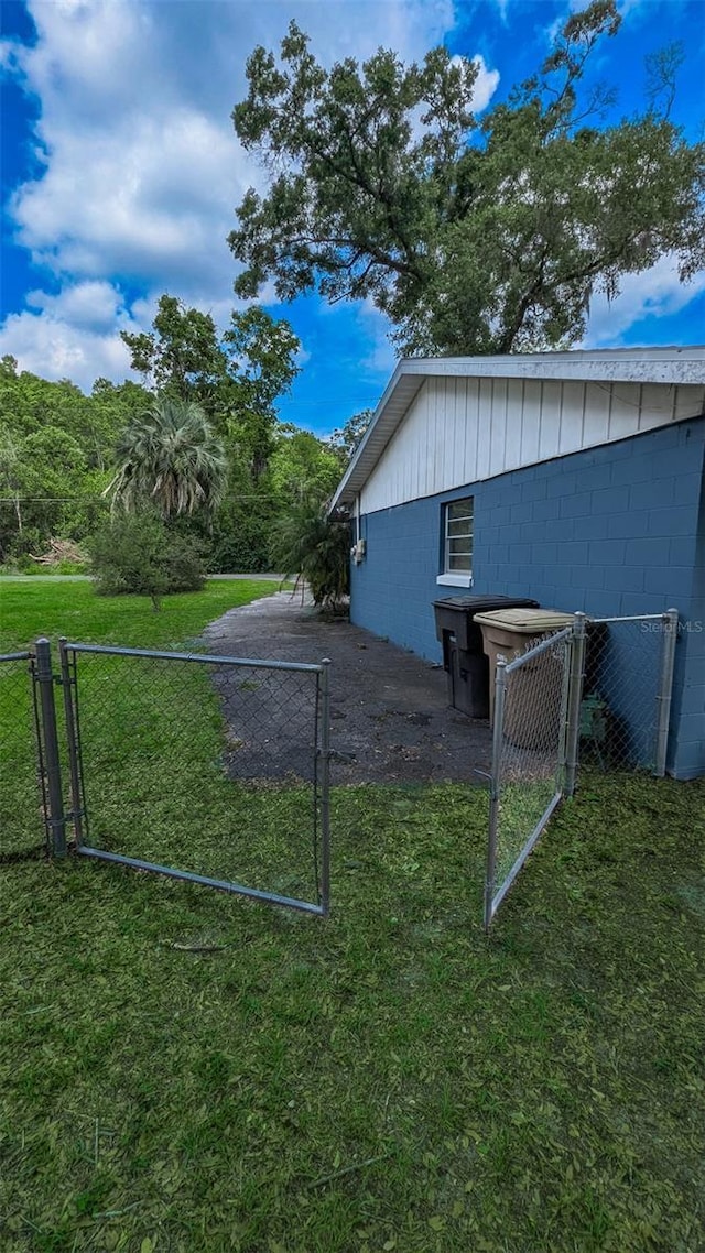 2928 NE 14th Ave, Ocala, FL 34479 - view of side of home with concrete block siding