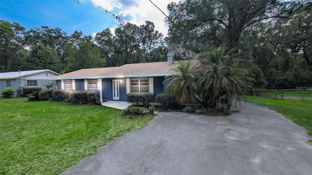 2928 NE 14th Ave, Ocala, FL 34479 - single story home featuring driveway and a chimney
