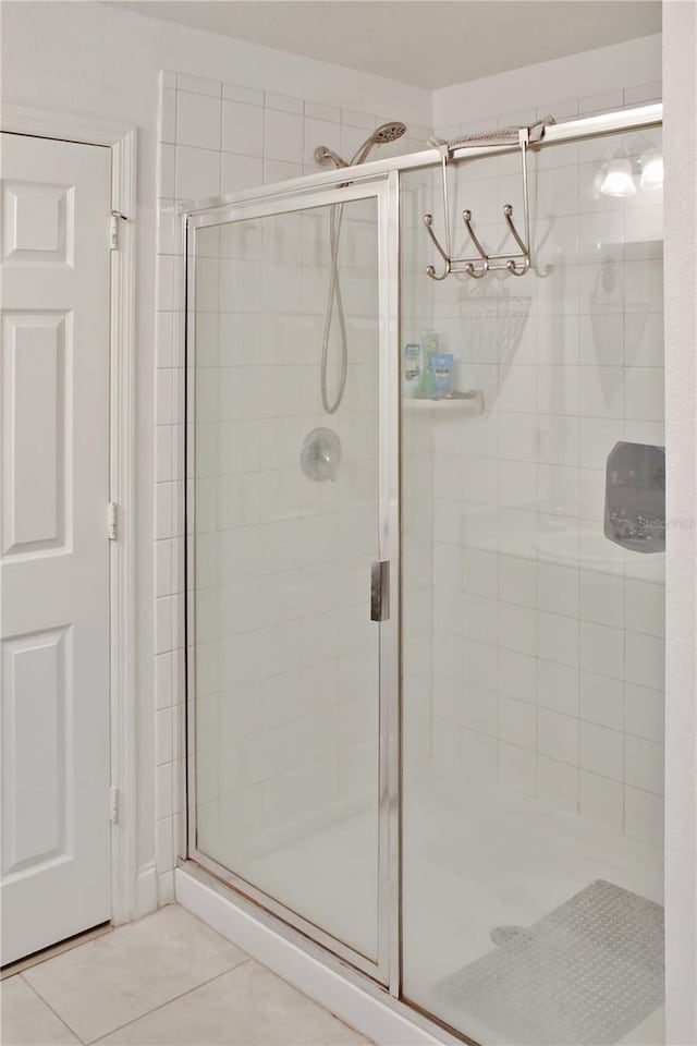 2835 Mosshire Cir, Saint Cloud, FL 34772 - full bath featuring a shower stall and tile patterned floors