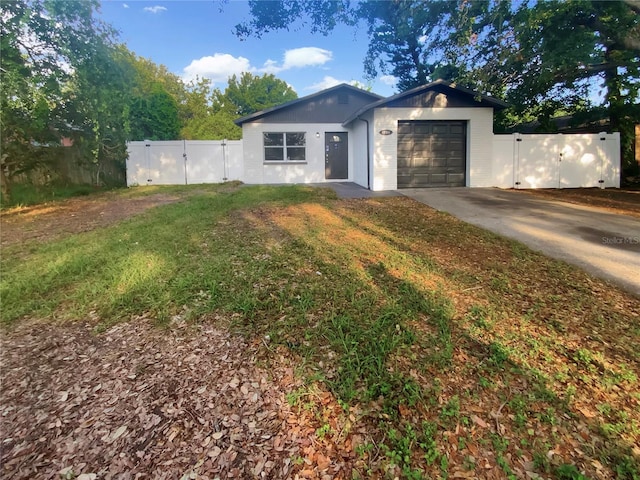 1736 Taylor Lake Pl, Largo, FL 33778 - ranch-style house with a gate, a garage, and driveway
