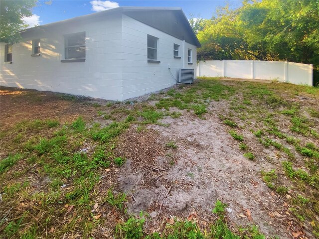 1736 Taylor Lake Pl, Largo, FL 33778 - view of property exterior featuring concrete block siding and cooling unit