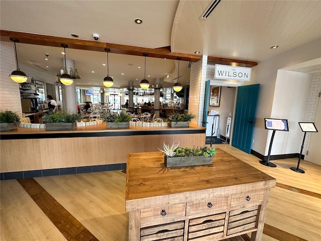 225 Celebration Pl Unit 527, Kissimmee, FL 34747 - bar area featuring wood finished floors, pendant lighting, and recessed lighting