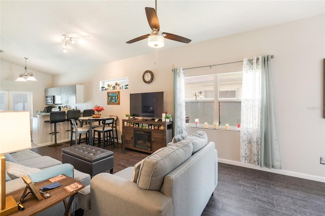 2903 Willow Oak Ct, Kissimmee, FL 34744 - living room with ceiling fan, dark wood-type flooring, and baseboards