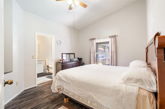 2903 Willow Oak Ct, Kissimmee, FL 34744 - bedroom featuring vaulted ceiling, dark wood-style flooring, baseboards, ensuite bathroom, and a ceiling fan