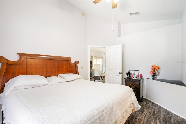 2903 Willow Oak Ct, Kissimmee, FL 34744 - bedroom with dark wood-type flooring, high vaulted ceiling, a ceiling fan, and baseboards