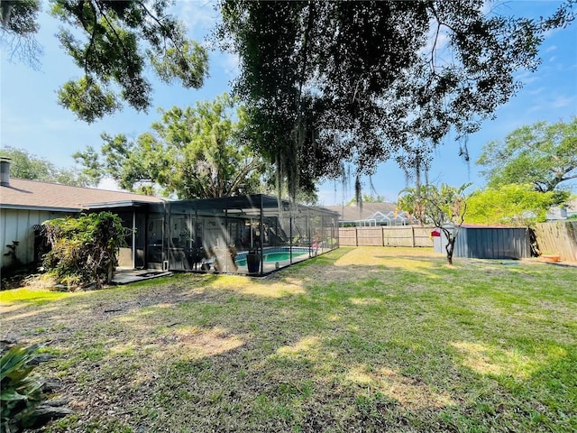 3565 E Lake Dr, Land O Lakes, FL 34639 - view of yard featuring glass enclosure