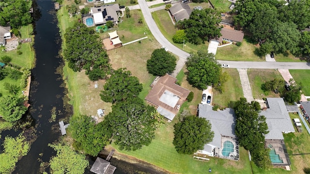 3565 E Lake Dr, Land O Lakes, FL 34639 - aerial view of property and surrounding area featuring nearby suburban area and a pool