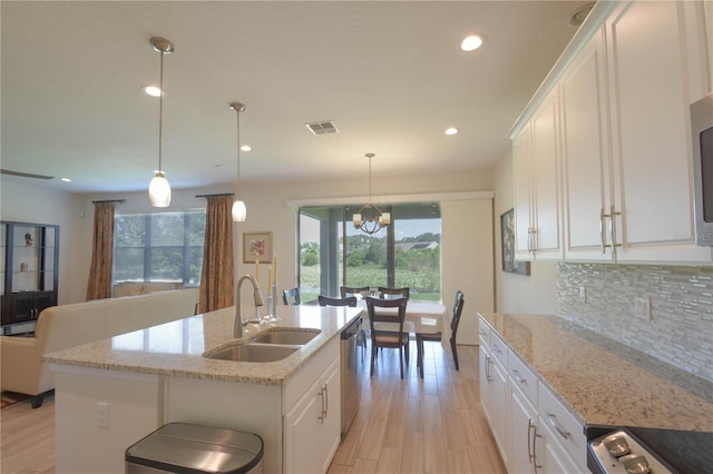 5908 Paxton Ct, Apopka, FL 32703 - kitchen featuring a sink, white cabinets, backsplash, and recessed lighting