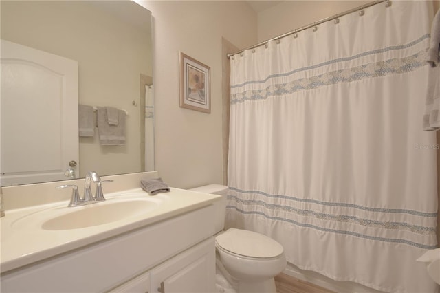 5908 Paxton Ct, Apopka, FL 32703 - bathroom with toilet, vanity, and a shower with shower curtain