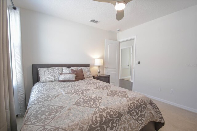 5908 Paxton Ct, Apopka, FL 32703 - bedroom with carpet flooring, a ceiling fan, and baseboards