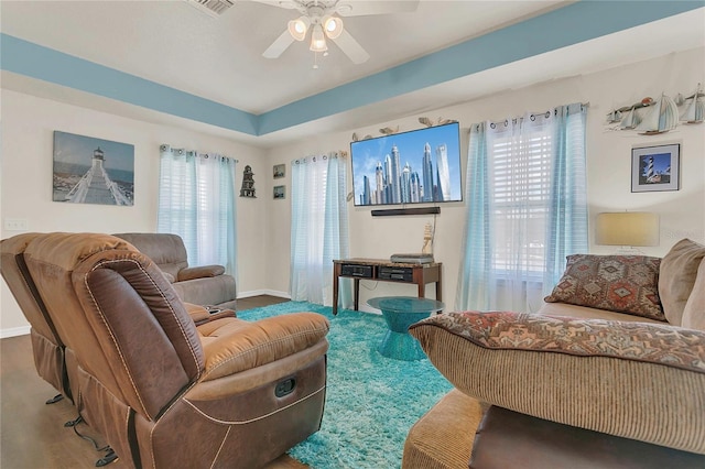 106 Turtle Run, Umatilla, FL 32784 - living room with a ceiling fan and baseboards