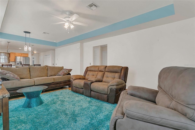 106 Turtle Run, Umatilla, FL 32784 - living room featuring ceiling fan