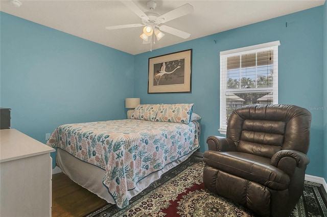 106 Turtle Run, Umatilla, FL 32784 - bedroom featuring wood finished floors, baseboards, and a ceiling fan