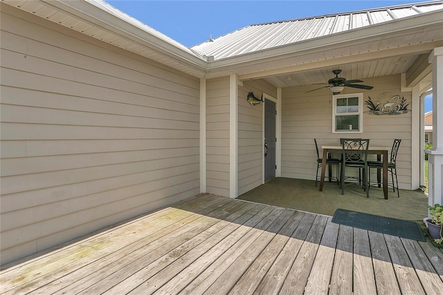 106 Turtle Run, Umatilla, FL 32784 - wooden deck with ceiling fan and outdoor dining space