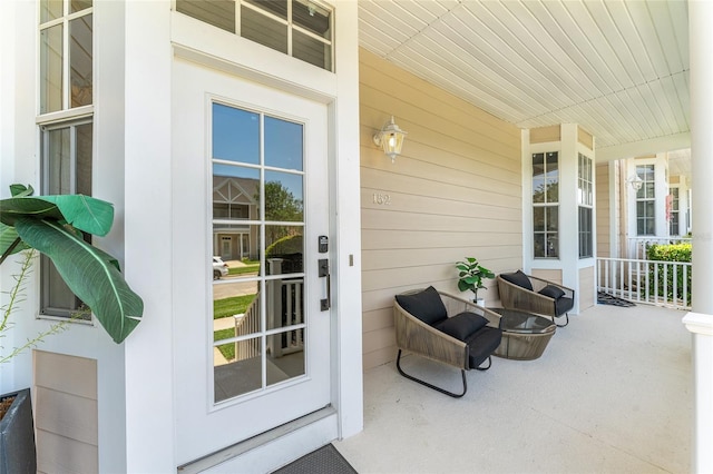 152 Riggings Way, Clermont, FL 34711 - doorway to property featuring a porch