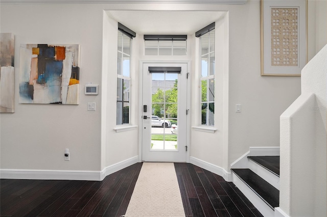 152 Riggings Way, Clermont, FL 34711 - doorway with wood finished floors and baseboards