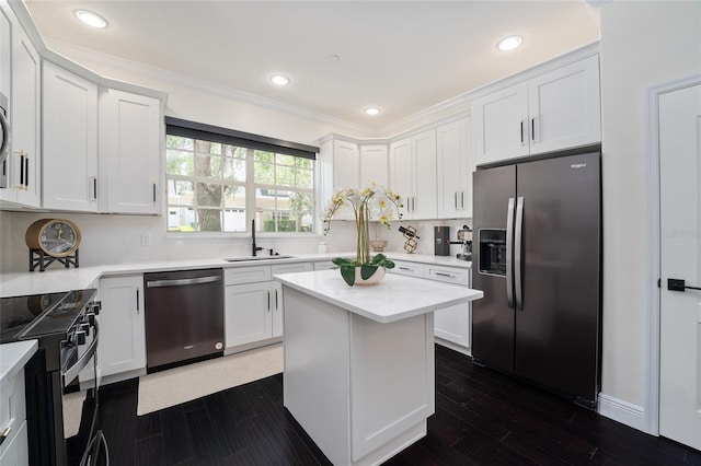 152 Riggings Way, Clermont, FL 34711 - kitchen featuring appliances with stainless steel finishes, a sink, white cabinets, light countertops, and dark wood finished floors