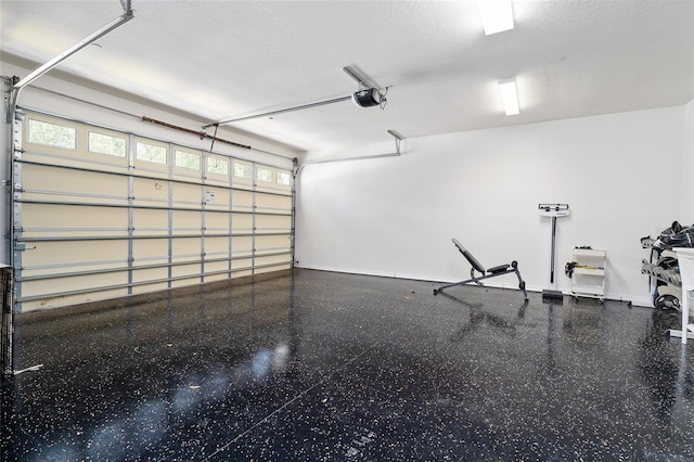 152 Riggings Way, Clermont, FL 34711 - garage featuring baseboards and a garage door opener