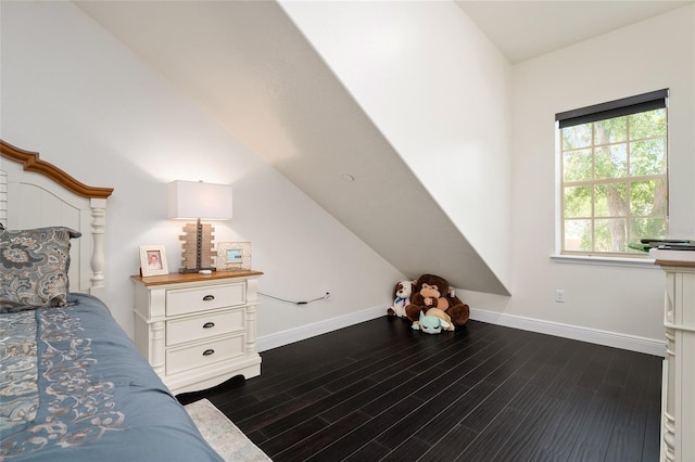 152 Riggings Way, Clermont, FL 34711 - bedroom with baseboards, dark wood-style floors, and lofted ceiling