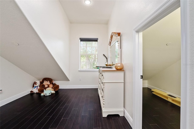 152 Riggings Way, Clermont, FL 34711 - additional living space with dark wood-style flooring and baseboards