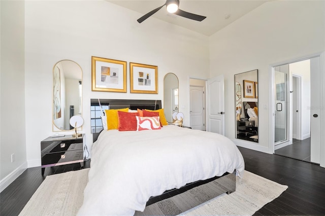 152 Riggings Way, Clermont, FL 34711 - bedroom featuring dark wood-type flooring, baseboards, high vaulted ceiling, and ceiling fan