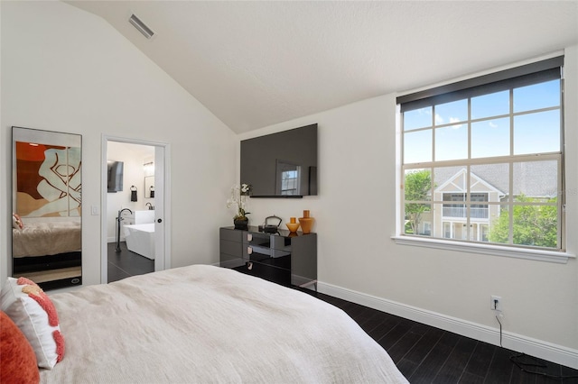 152 Riggings Way, Clermont, FL 34711 - bedroom featuring baseboards, multiple windows, dark wood-type flooring, high vaulted ceiling, and ensuite bath
