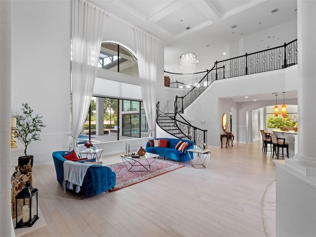 4071 Isabella Cir, Windermere, FL 34786 - living room with coffered ceiling, a towering ceiling, wood finished floors, beamed ceiling, and stairs