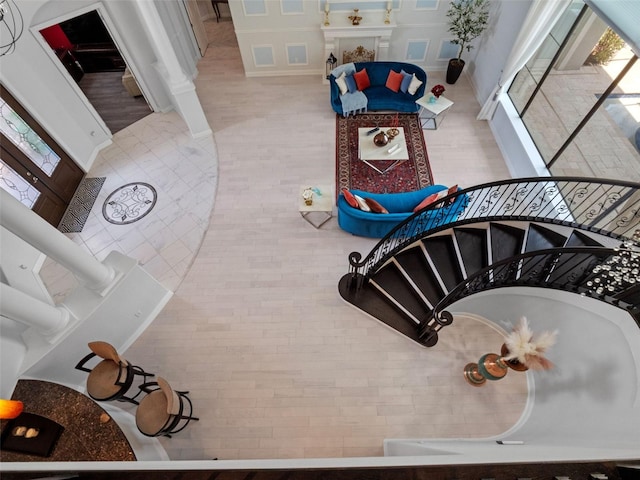 4071 Isabella Cir, Windermere, FL 34786 - stairway featuring healthy amount of natural light and decorative columns