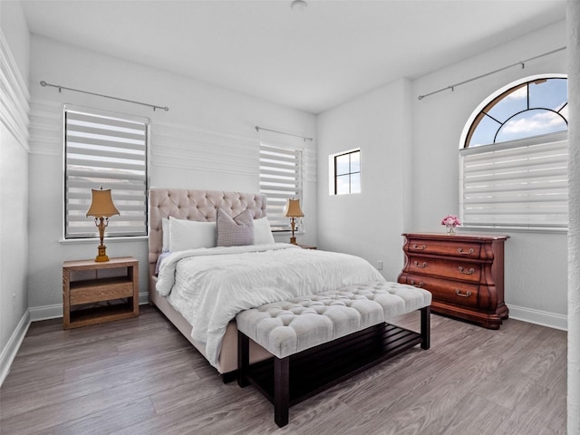 4071 Isabella Cir, Windermere, FL 34786 - bedroom with wood finished floors and baseboards