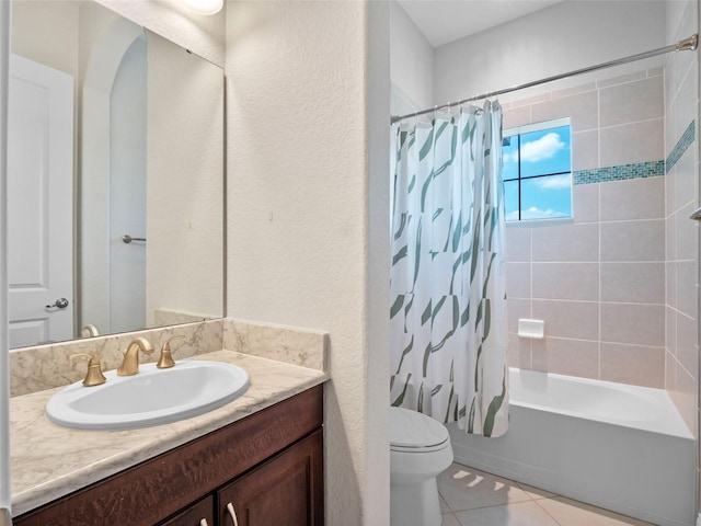4071 Isabella Cir, Windermere, FL 34786 - bathroom with tile patterned floors, vanity, shower / bath combination with curtain, toilet, and a textured wall