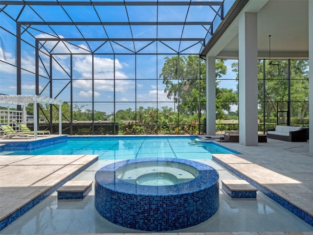 4071 Isabella Cir, Windermere, FL 34786 - view of pool featuring a pool with connected hot tub, a patio area, glass enclosure, and an outdoor hangout area