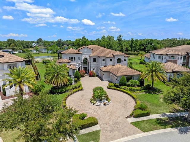 4071 Isabella Cir, Windermere, FL 34786 - mediterranean / spanish house with curved driveway and a water view