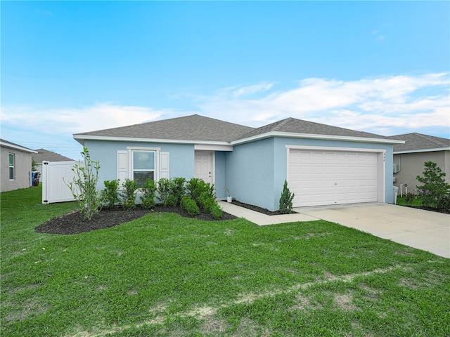 440 Patricia Alford Dr, Haines City, FL 33844 - single story home with a garage, driveway, stucco siding, and a front yard