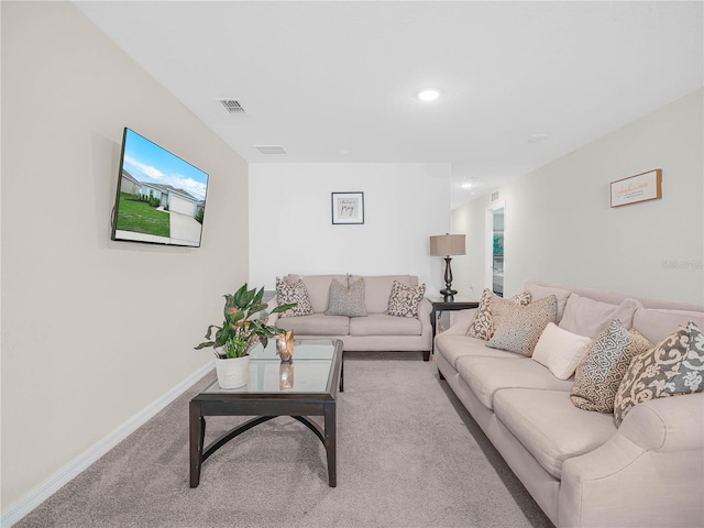440 Patricia Alford Dr, Haines City, FL 33844 - carpeted living area with baseboards and recessed lighting