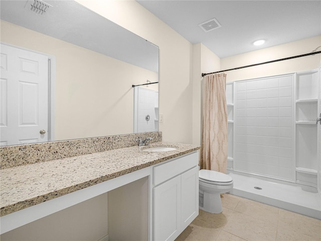 440 Patricia Alford Dr, Haines City, FL 33844 - bathroom featuring toilet, vanity, curtained shower, and tile patterned flooring