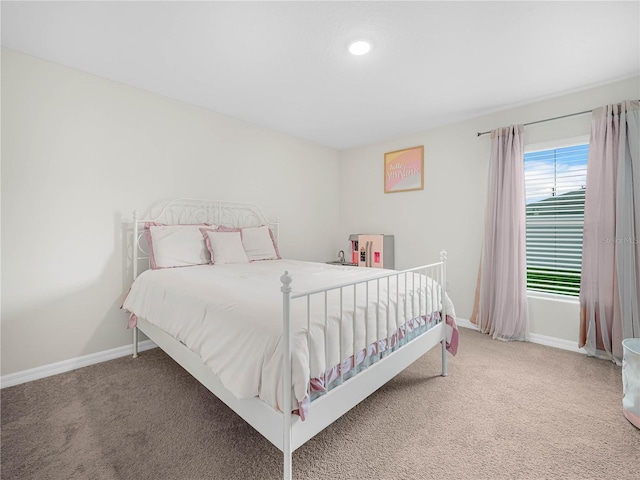 440 Patricia Alford Dr, Haines City, FL 33844 - bedroom featuring light colored carpet, baseboards, and recessed lighting