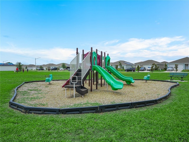 440 Patricia Alford Dr, Haines City, FL 33844 - community play area with a lawn and a residential view