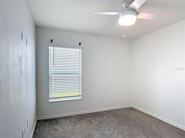 2836 Sanctuary Dr, Clermont, FL 34714 - carpeted spare room featuring plenty of natural light, a ceiling fan, and baseboards