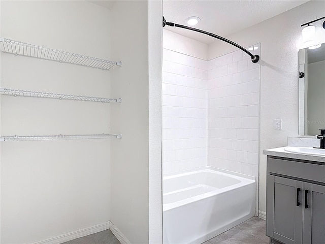 2836 Sanctuary Dr, Clermont, FL 34714 - full bathroom featuring vanity, shower / washtub combination, baseboards, and tile patterned flooring