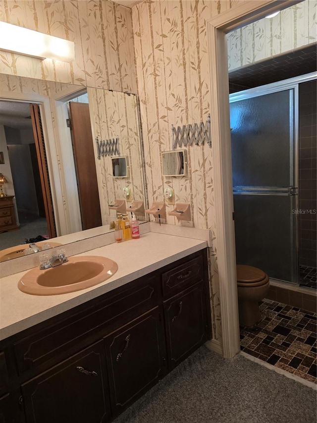 579 Rockingham Rd, Orange Park, FL 32073 - full bathroom with wallpapered walls, vanity, toilet, and a stall shower