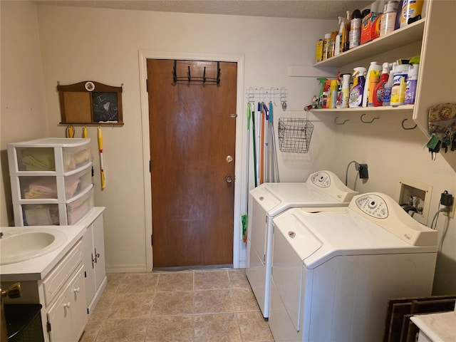 579 Rockingham Rd, Orange Park, FL 32073 - laundry room with washing machine and clothes dryer, cabinet space, and baseboards