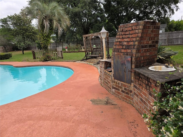 579 Rockingham Rd, Orange Park, FL 32073 - view of swimming pool featuring a patio area