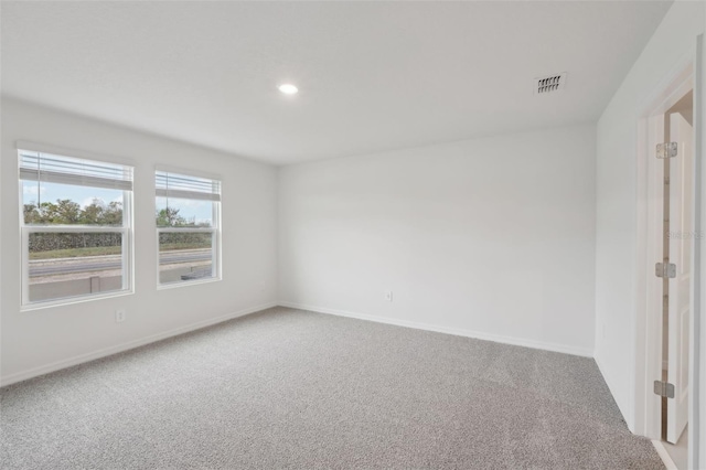 1855 Brekey Way, Zephyrhills, FL 33541 - unfurnished room with carpet flooring and recessed lighting