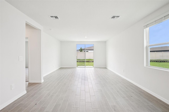 1828 Brekey Way, Zephyrhills, FL 33541 - unfurnished room featuring wood finished floors and baseboards